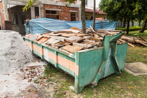 Domestic skip placement in a Mill Hill garden