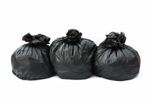 Waste collection trucks in Mill Hill