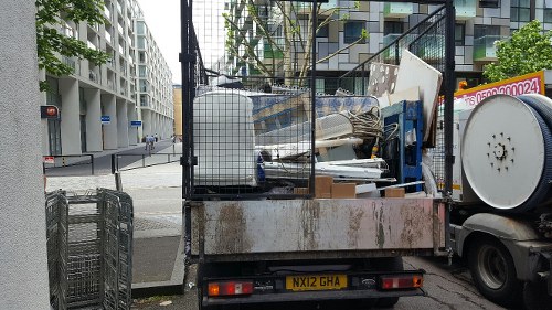 Workers segregating construction waste